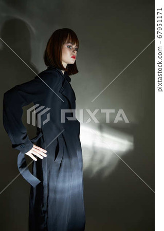 adult model black cloak isolated background modern style 67951171