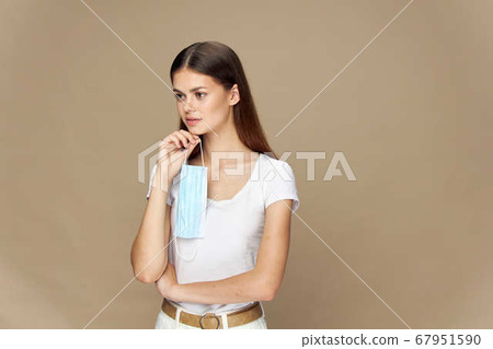 Girl fashion clothes in a protective mask flu virus 67951590