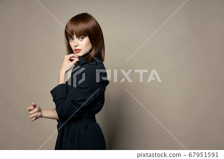 Woman in black coat model new autumn clothes 67951591