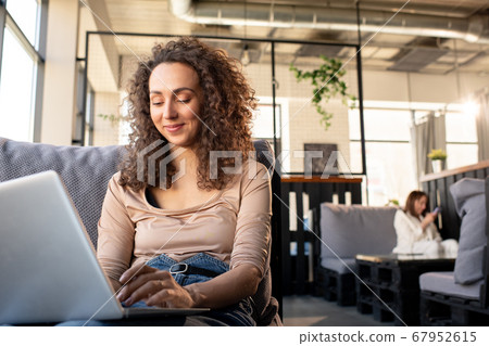 Pretty girl interacting on social media Pretty girl interacting on social media 67952615