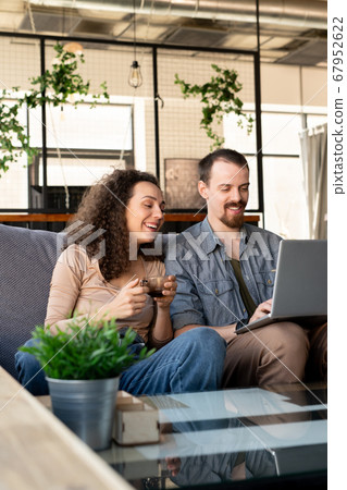 Business couple discussing project Business couple discussing project 67952622