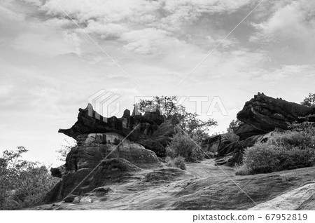Rocky landscape under bright sky at Phu Pha Thoep. Mukdahan - Thailand 67952819