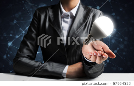 Concept of lightbulb as symbol of new idea. Concept of lightbulb as symbol of new idea. 67954533