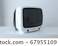 A white 14" color crt television on a white desk and wall in oblique angle 67955109