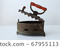 Vintage rusty iron with red wood handle 67955113