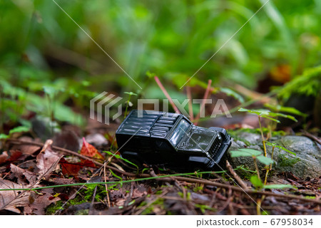 A car running on a rough road A car running on a rough road 67958034