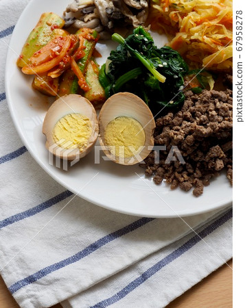 Korean side dishes, egg, beef, cucumber, mushroom, spinach, potato Korean side dishes, egg, beef, cucumber, mushroom, spinach, potato 67958278
