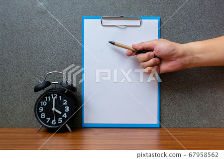 Black vintage alarm clock with clipboard and blank Black vintage alarm clock with clipboard and blank 67958562