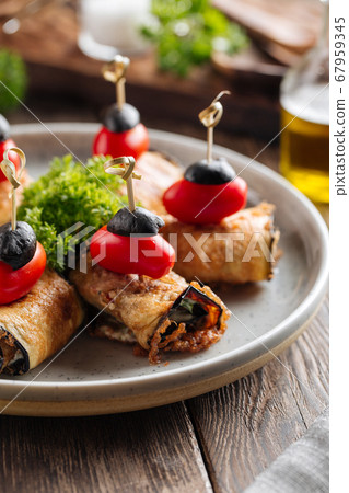 Closeup on eggplant rolls appetizer 67959345