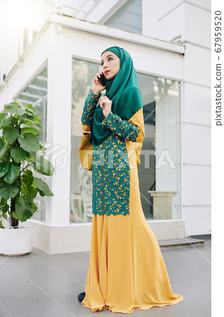 Muslim woman in traditional dres Muslim woman in traditional dres 67959520