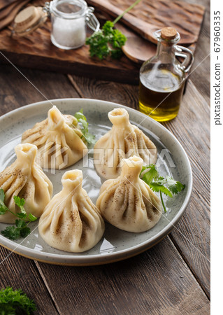 Closeup on georgian dumplings khinkali Closeup on georgian dumplings khinkali 67960335