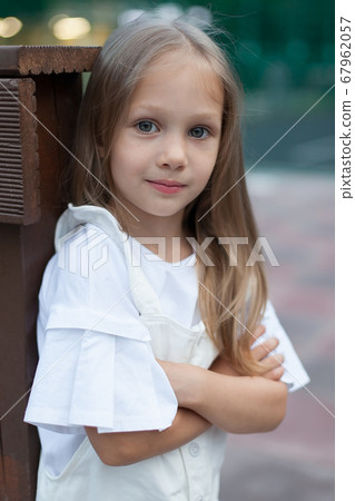 Happy Lifestyle portrait of a beautiful young model girl with a sweet smile. Happy Lifestyle portrait of a beautiful young model girl with a sweet smile. 67962057