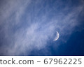 Moon in the clouds 67962225