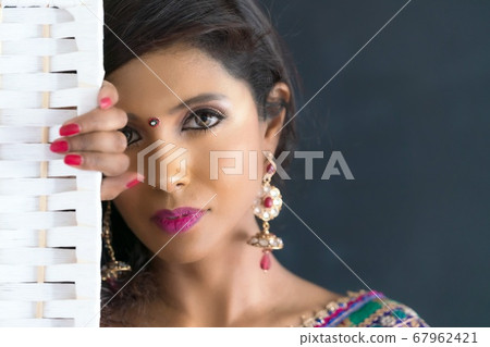 Portrait of Indian woman wearing sari 67962421