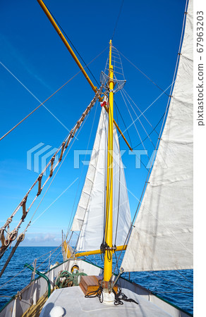 Sailing old schooner on a beautiful sunny day. Sailing old schooner on a beautiful sunny day. 67963203