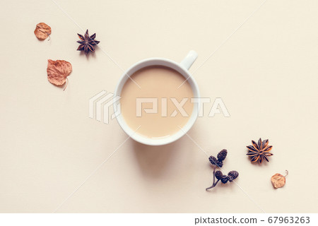 A cup of hot coffee or tea on pastel background. A cup of hot coffee or tea on pastel background. 67963263