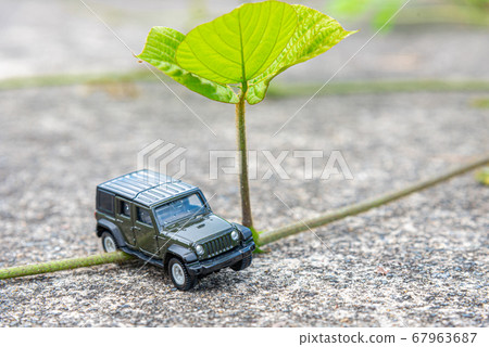 A car running on a rough road A car running on a rough road 67963687