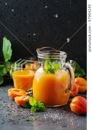 Fresh sweet apricot juice and mint Fresh sweet apricot juice and mint 67964245