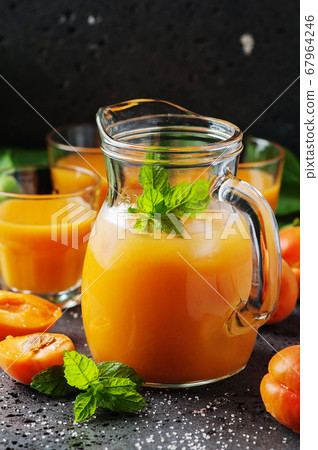 Fresh sweet apricot juice and mint Fresh sweet apricot juice and mint 67964246