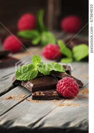 Dark chocolate with mint and raspberry on the Dark chocolate with mint and raspberry on the 67964650