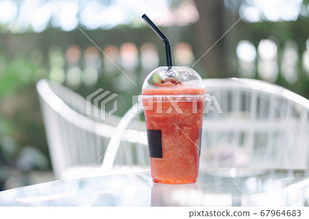 Closeup watermelon smoothie on wood table, Closeup watermelon smoothie on wood table, 67964683