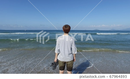 Man enjoying vacation at sea 67964893
