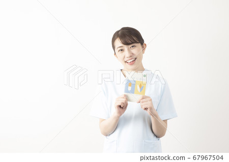Female pharmacist with medicine notebook Female pharmacist with medicine notebook 67967504