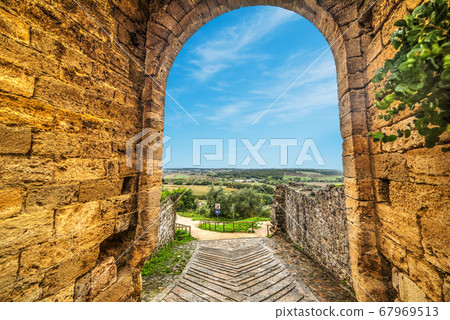 Monteriggioni city wall under a blue sky 67969513