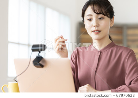 Business woman in an online meeting 67970628