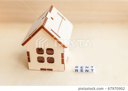 Miniature toy model house with inscription RENT Miniature toy model house with inscription RENT 67970902