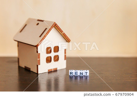 Miniature toy model house with inscription RENT Miniature toy model house with inscription RENT 67970904