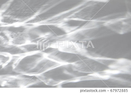shadow and light caustic effect on a white wall shadow and light caustic effect on a white wall 67972885