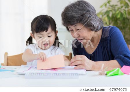 Grandma and grandchildren · playing 67974073