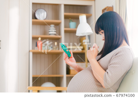 Mosquito coil incense pregnant woman doubts copy space 67974100