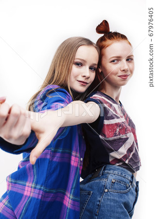 best friends teenage girls together having fun, posing emotional on white background, besties happy smiling, lifestyle people concept best friends teenage girls together having fun, posing emotional on white background, besties happy smiling, lifestyle people concept 67976405