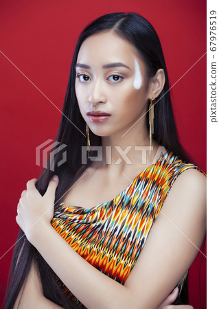 beauty young asian girl with fashion make up on red background , beauty stylish look 67976519