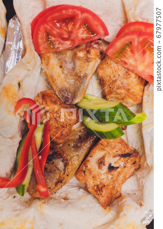 Grilled minced lamb kebabs on the grill. 67977507