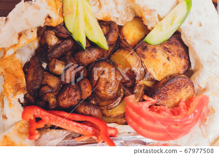 Grilled minced lamb kebabs on the grill. Grilled minced lamb kebabs on the grill. 67977508