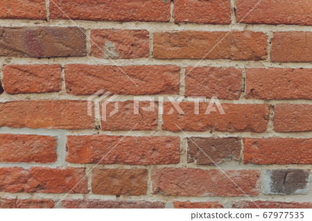 red brick wall texture grunge background with vignetted corners, may use to interior design. red brick wall texture grunge background with vignetted corners, may use to interior design. 67977535