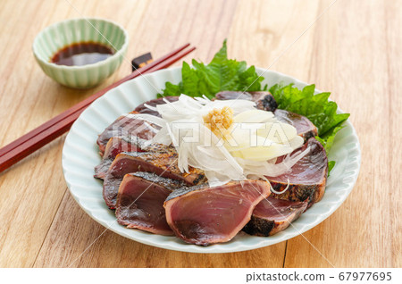 Seared bonito on a plate Seared bonito on a plate 67977695
