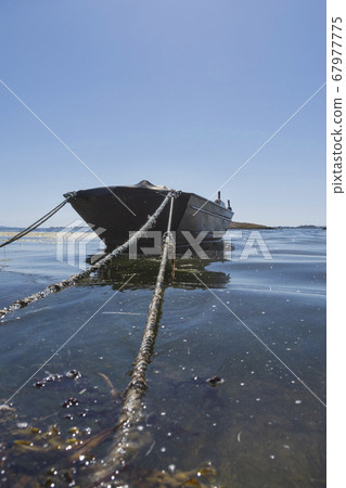 Fisherman boat on the beach Fisherman boat on the beach 67977775