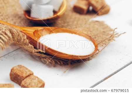 Various kinds of sugar in spoon. creative photo. Various kinds of sugar in spoon. creative photo. 67979015