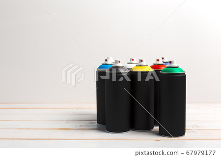 Spray paint cans close up. creative photo. Spray paint cans close up. creative photo. 67979177