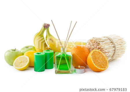Still life of tropical fruits, essential oils and aroma diffuser. Still life of tropical fruits, essential oils and aroma diffuser. 67979183