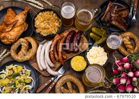 Oktoberfest dishes with beer, pretzel and sausage Oktoberfest dishes with beer, pretzel and sausage 67979510