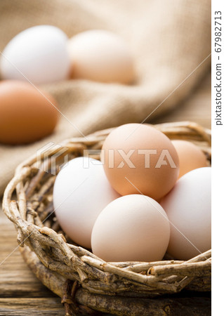 Eggs in a basket 67982713