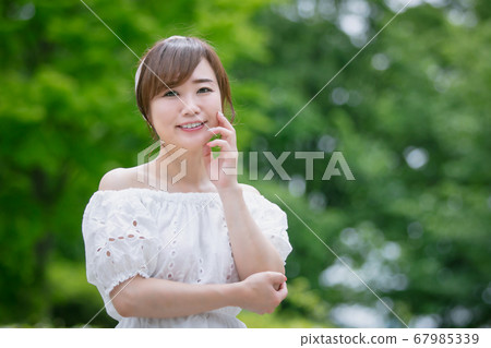Woman in the green Woman in the green 67985339