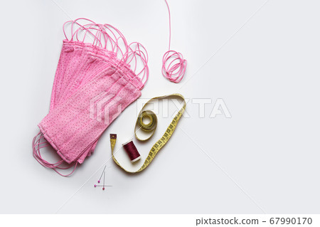 Colorful fabric masks sewn at home to protect Colorful fabric masks sewn at home to protect 67990170