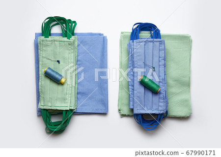 Colorful fabric masks sewn at home to protect Colorful fabric masks sewn at home to protect 67990171