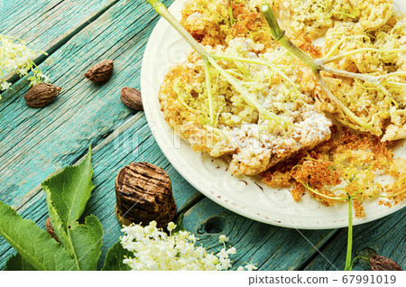 Fried elderberry flowers. Fried elderberry flowers. 67991019